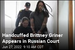 Handcuffed Brittney Griner Appears in Russian Court