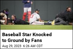 Baseball Star Knocked to Ground by Fans