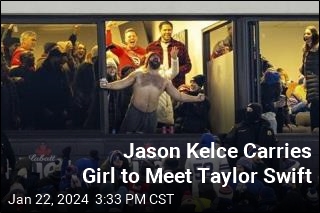 Jason Kelce Carries Girl to Meet Taylor Swift