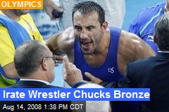 Irate Wrestler Chucks Bronze