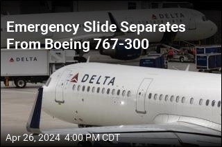 Emergency Slide Separates From Boeing 767-300