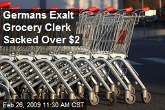 Germans Exalt Grocery Clerk Sacked Over $2