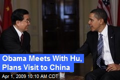 Obama Meets With Hu, Plans Visit to China