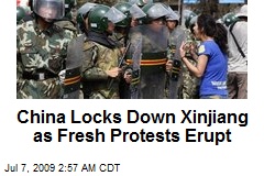 China Locks Down Xinjiang as Fresh Protests Erupt