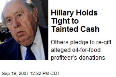 Hillary Holds Tight to Tainted Cash