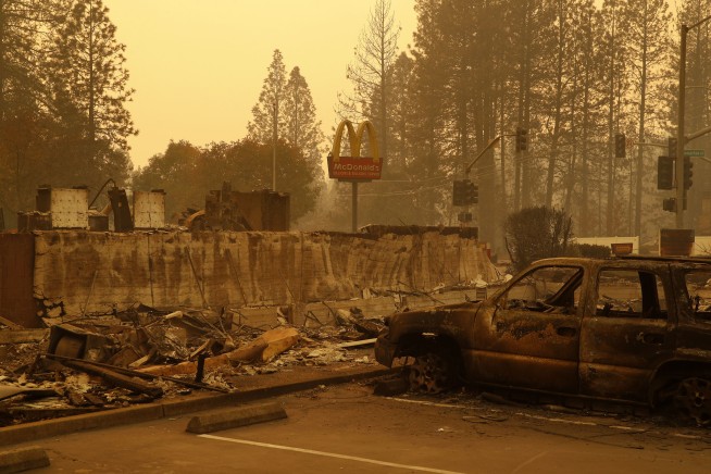 Holding out slim hope as crews search for more fire dead