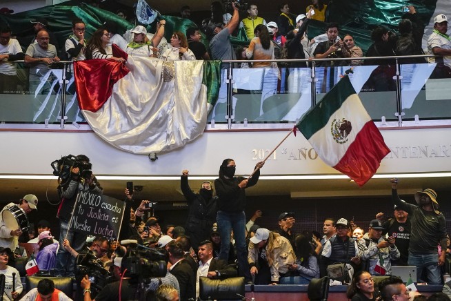 Mexico’s Senate approves a contentious judicial overhaul after protesters storm the chamber