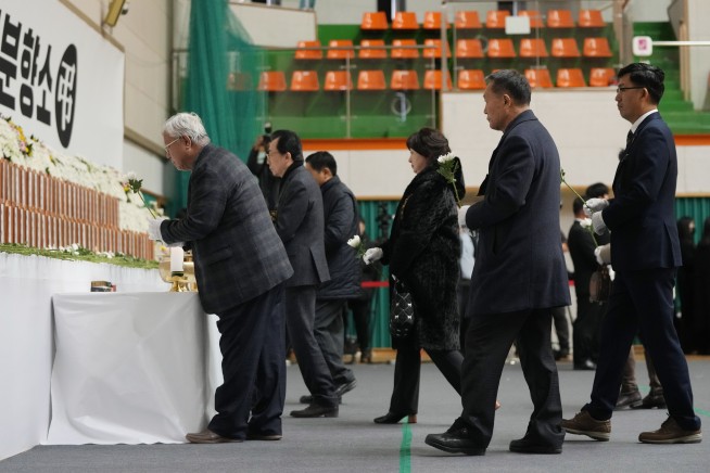 Jetliner skids off runway and bursts into flames while landing in South Korea, killing 179