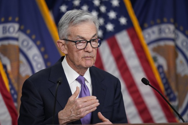 Federal Reserve keeps key interest rate unchanged and foresees 3 rate cuts next year