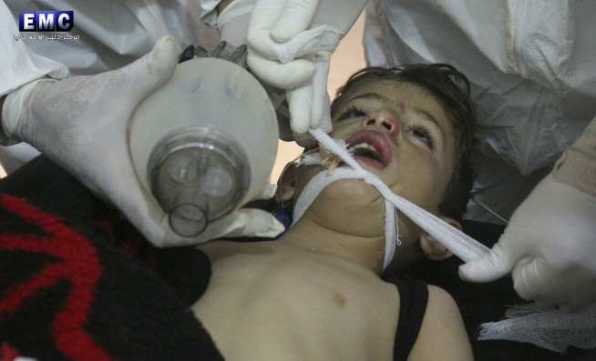 Syrian group raises death toll in suspected gas attack to 58