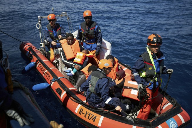 Aid ship with 64 migrants stuck in Mediterranean Sea