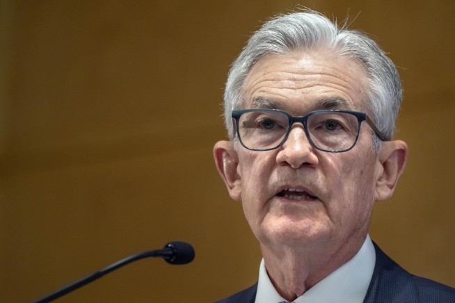 Fed's Powell notes inflation is easing but downplays discussion of interest rate cuts