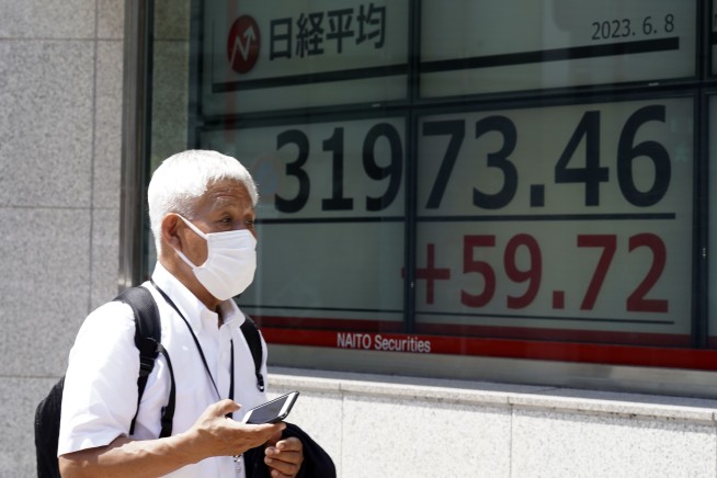 Stock market today: Asian shares slip following technology selloff on Wall Street