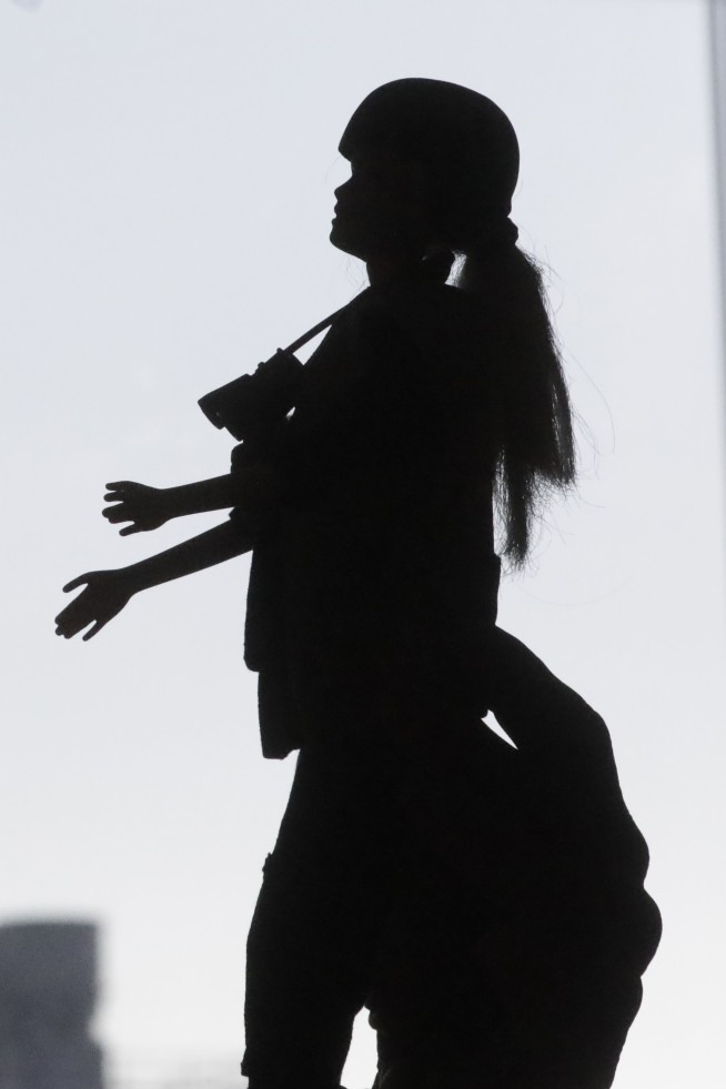 Forest ecologist helps refashion Barbie dolls as scientists