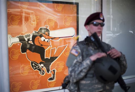 Latest on police-custody death: Protesters march in city