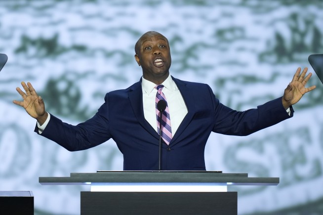 Donald Trump enters Republican convention hall with a bandaged ear and gets a hero's welcome