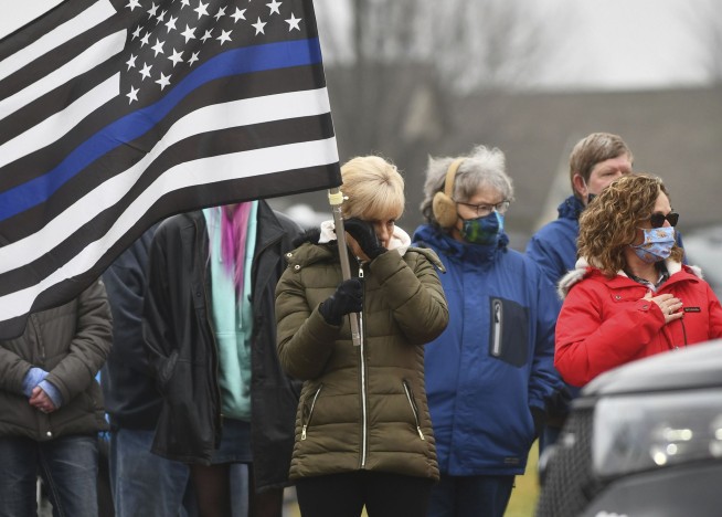 Prosecutor: Illinois cop was disarmed, killed with own gun