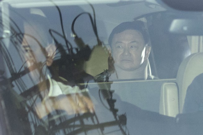 Thai ex-Prime Minister Thaksin, just freed from detention, may still face a royal defamation charge