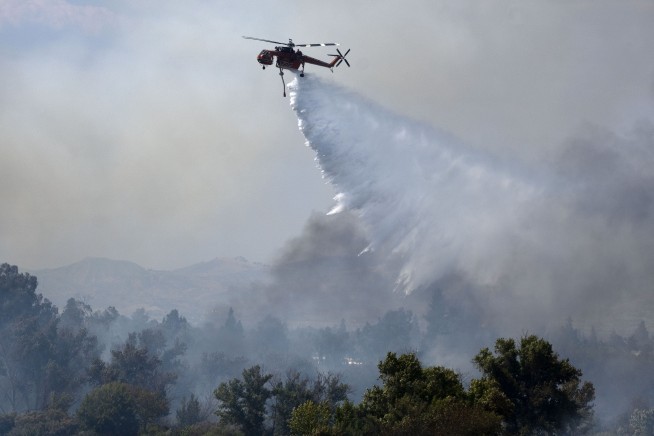 Firefighters overtaken by flames in California mountains
