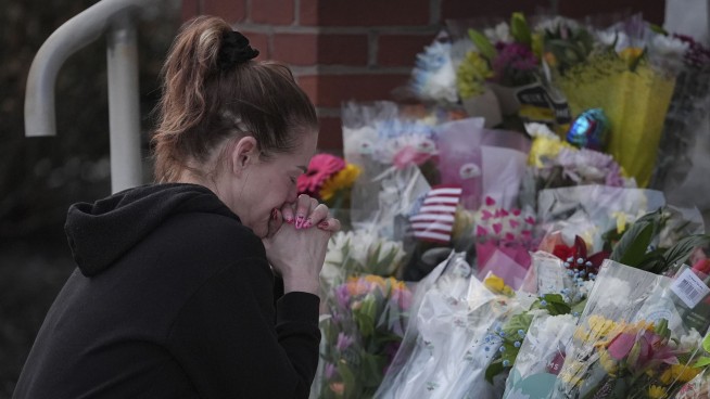 Officer killed in gunman's Pennsylvania hospital siege was felled by police fire, prosecutor says