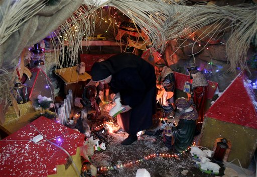 AP PHOTOS: Christmas celebrated near and far