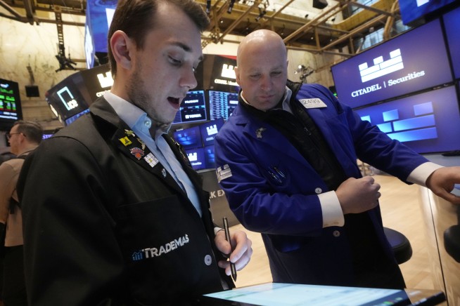 Wall Street rises after encouraging inflation data, but the trade war keeps knocking stocks around