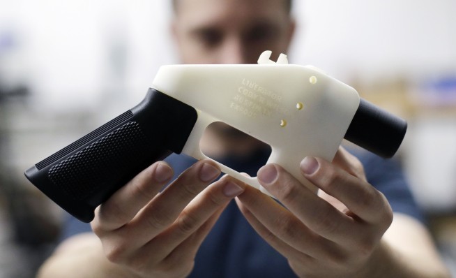 Texan says he's selling 3D-printed gun plans, despite ruling