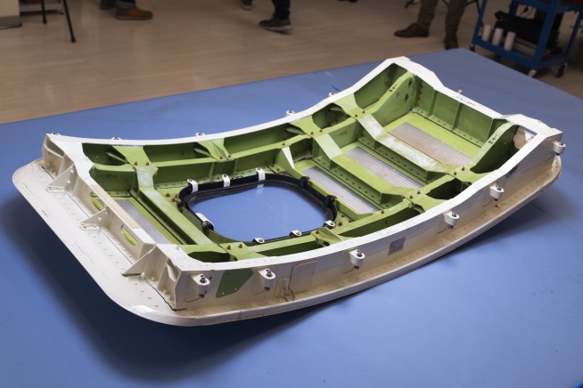 Boeing names its next CEO while posting a quarterly loss of more than $1.4 billion