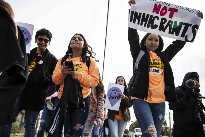 Judge orders end to DACA, current enrollees safe for now