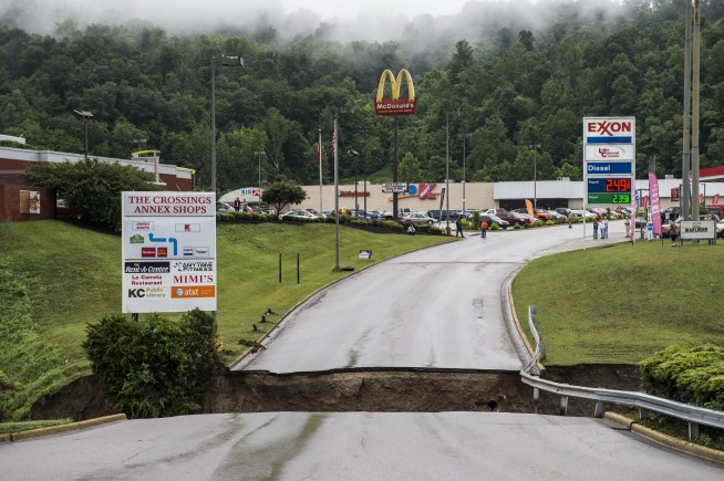 Crews rescue the stranded in West Virginia flooding; 23 dead
