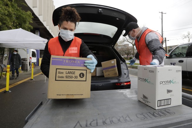 Key medical glove factories cutting staff 50% amid virus