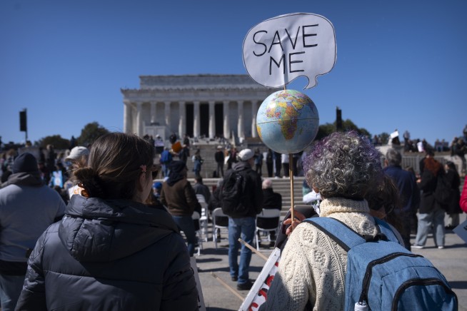 Out of the lab and into the streets, researchers and doctors rally for science against Trump cuts