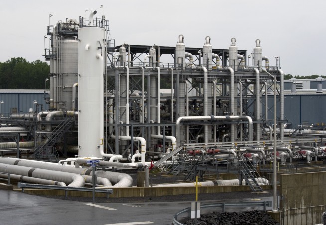 Biden delays consideration of new natural gas export terminals, citing climate risk