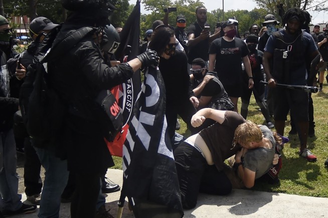 Police move in after fights break out during Georgia protest