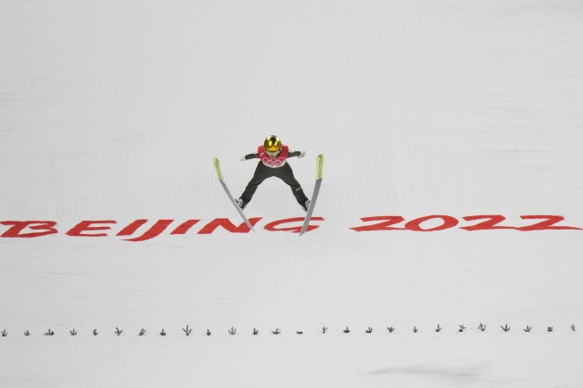 Olympic gold: Slovenia's Ursa Bogataj soars past competition