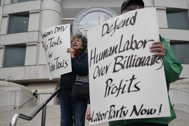 Two rival robotaxi services win approval to operate throughout San Francisco despite safety concerns