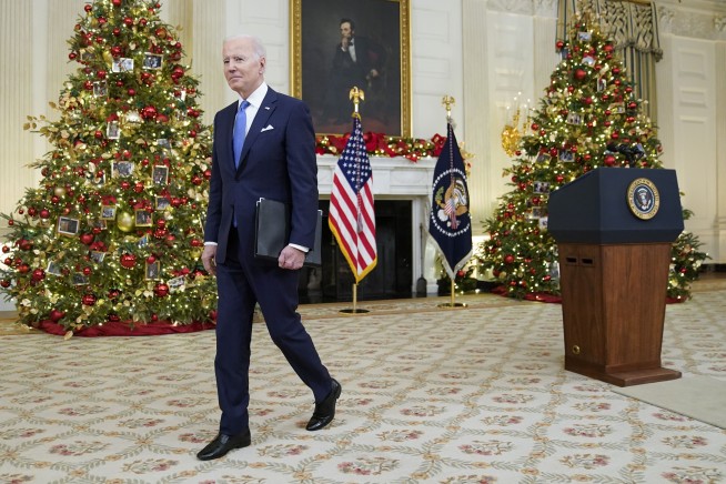 Biden pivots to home tests to confront omicron surge