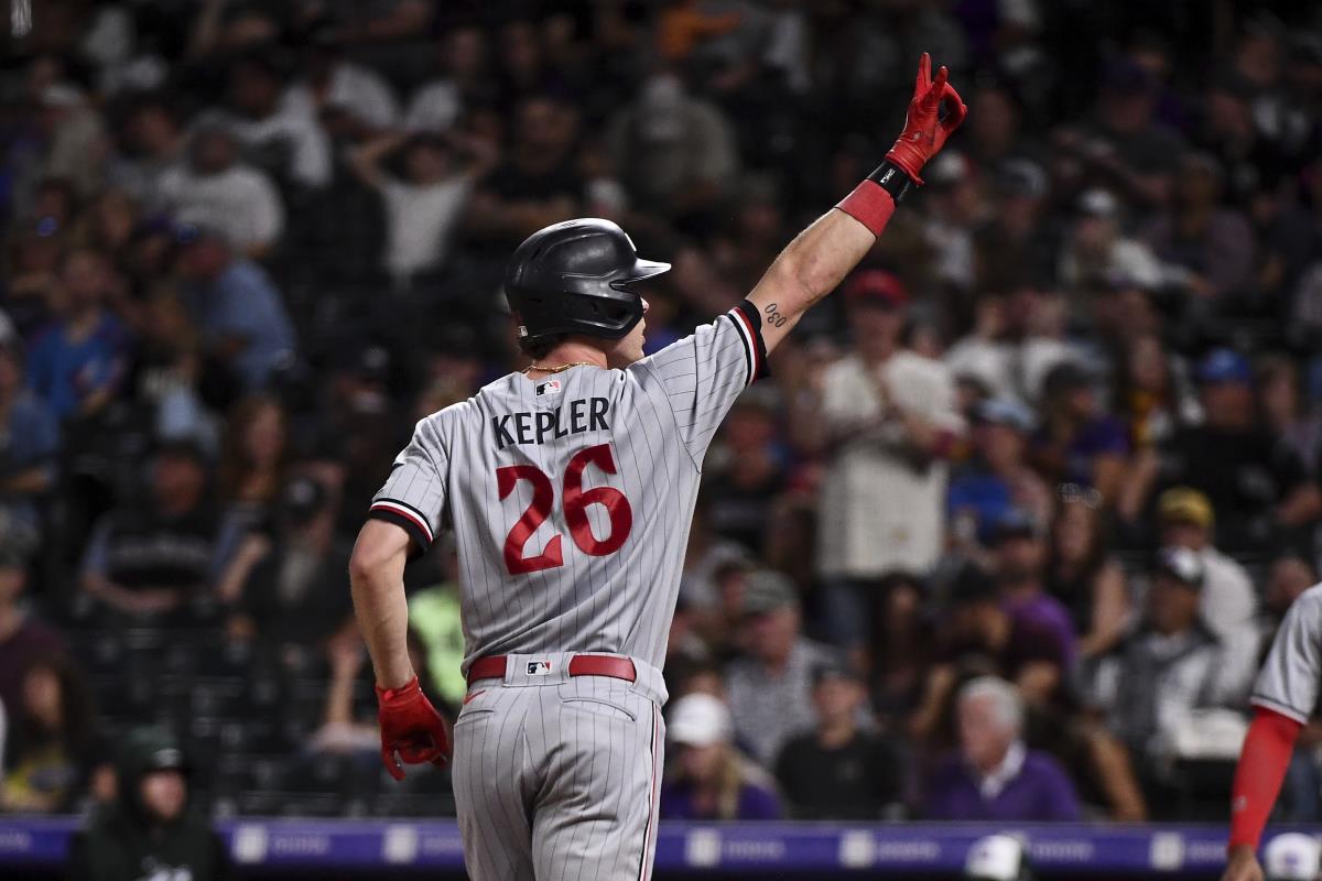 Playoff-bound Twins hit 3 homers in 7-6 victory over Rockies