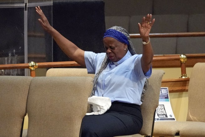 Florida Gov. Ron DeSantis booed at vigil as hundreds mourn more racist killings