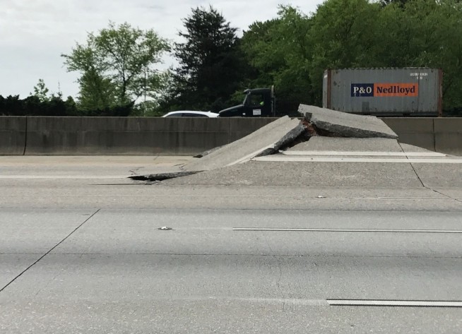 Atlanta: Concrete highway rupture sends motorcyclist flying