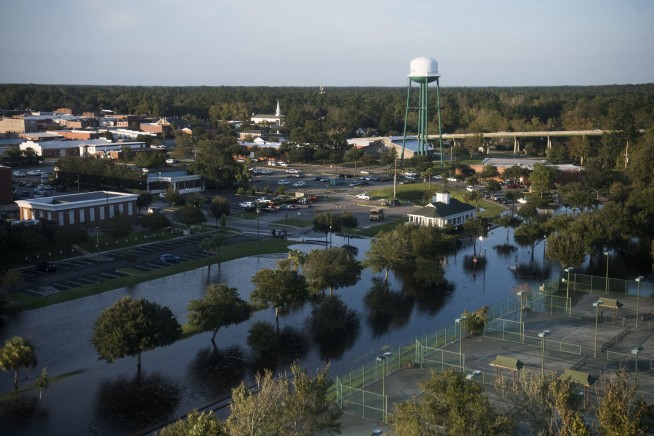 2 'detainees' drown as van swept into SC flood waters