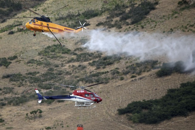 Utah man accused of causing wildfire by burning a spider