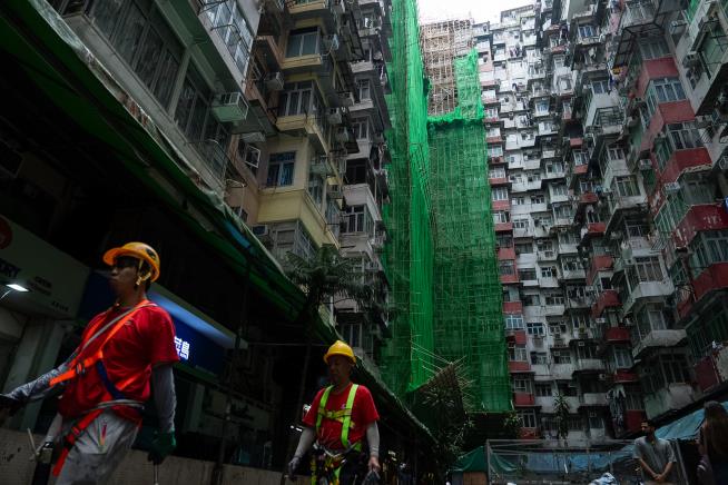 Hong Kong residents and experts defend bamboo scaffolding after deadly fire