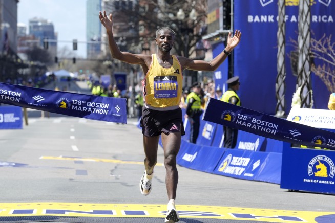 Ethiopia's Sisay Lemma wins Boston Marathon in runaway. Kenya's Hellen Obiri repeats in women's race