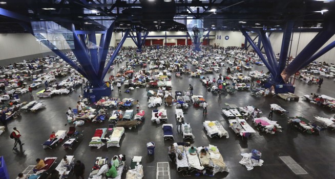 The Latest: Flash floods swamp Texas-Louisiana border towns