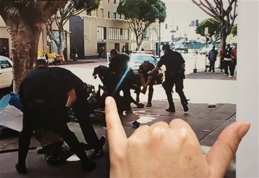 Details, questions emerge on homeless man shot by LA police