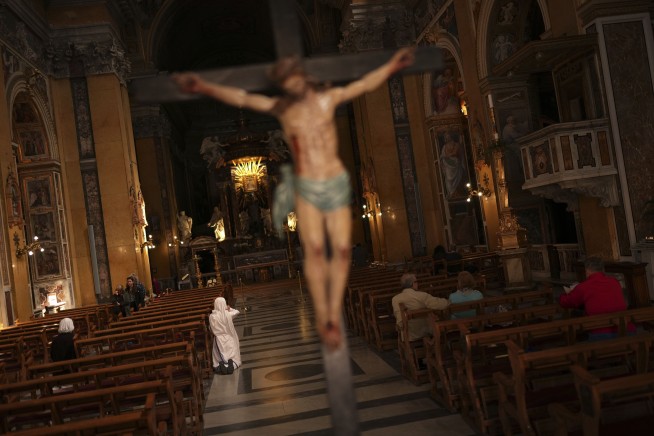 The Latest: Pope Francis lies in state ahead of his funeral, set for Saturday