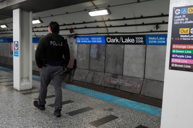 Man sets fire to a woman on a Chicago L train before fleeing, police say