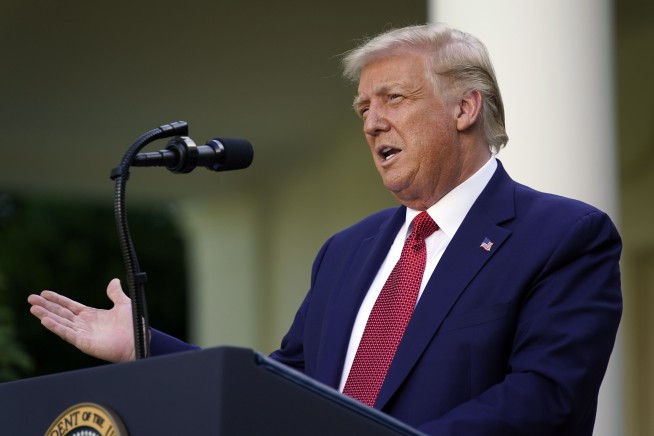 Trump signs bill, order rebuking China, and slams Biden