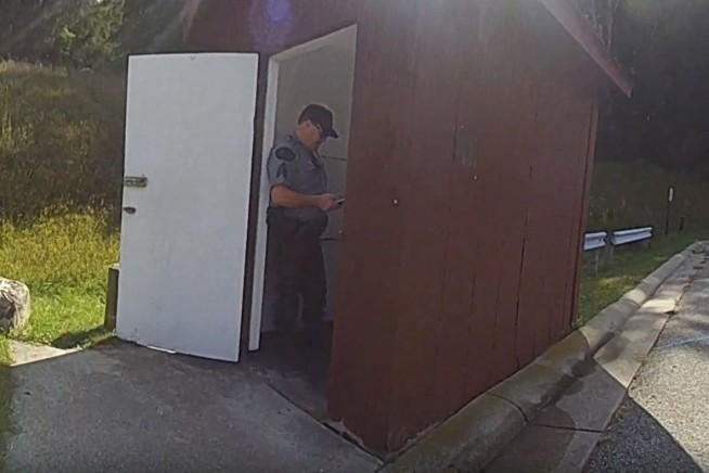Woman rescued from outhouse toilet after climbing in to retrieve Apple Watch, Michigan police say
